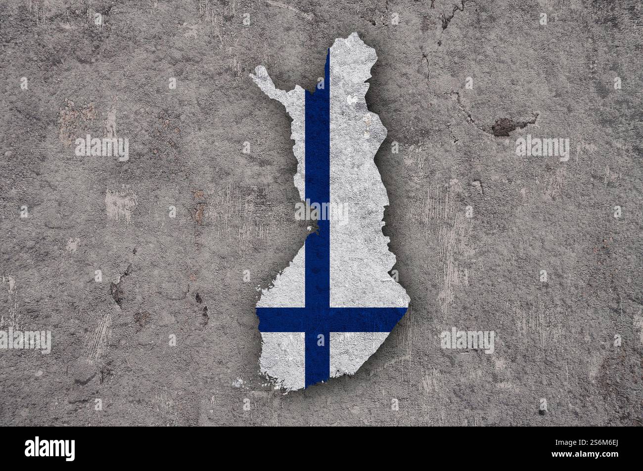Mappa e bandiera della Finlandia sul cemento intemperie Foto Stock