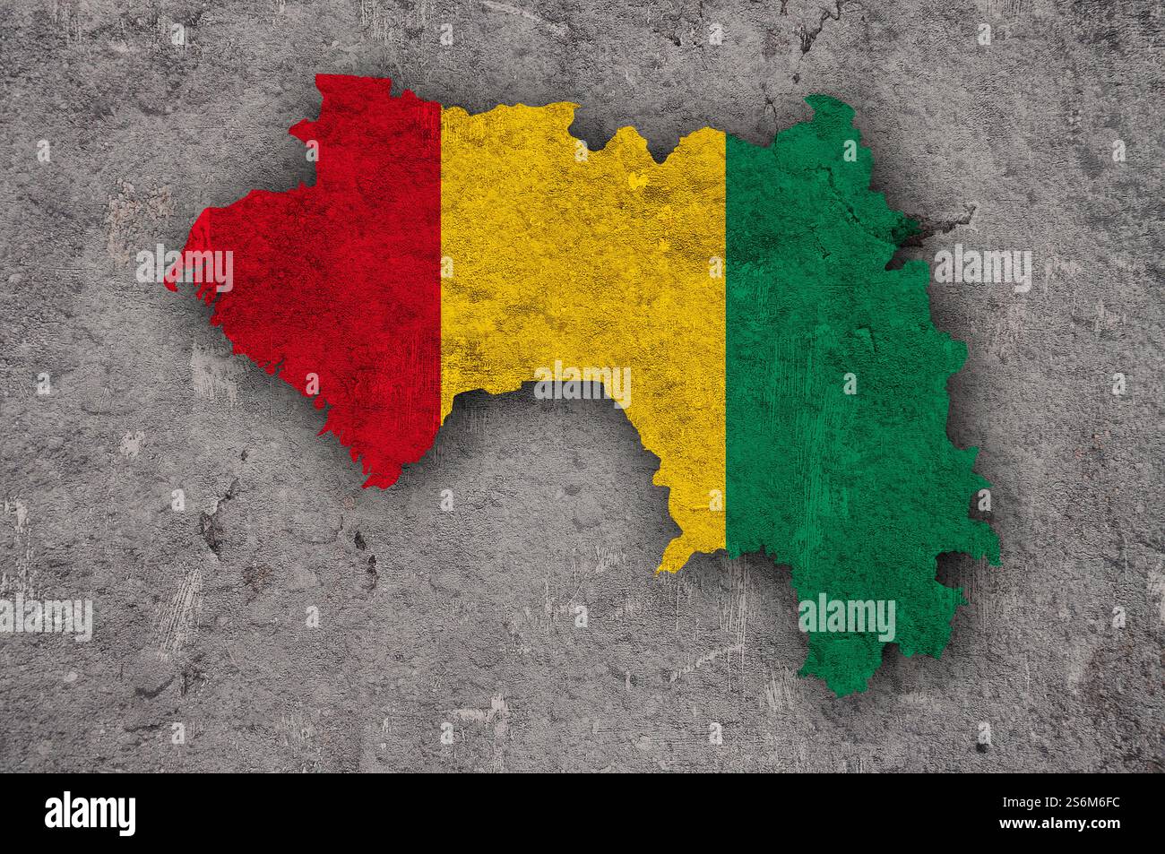 Mappa e bandiera della Guinea su cemento intemperie Foto Stock