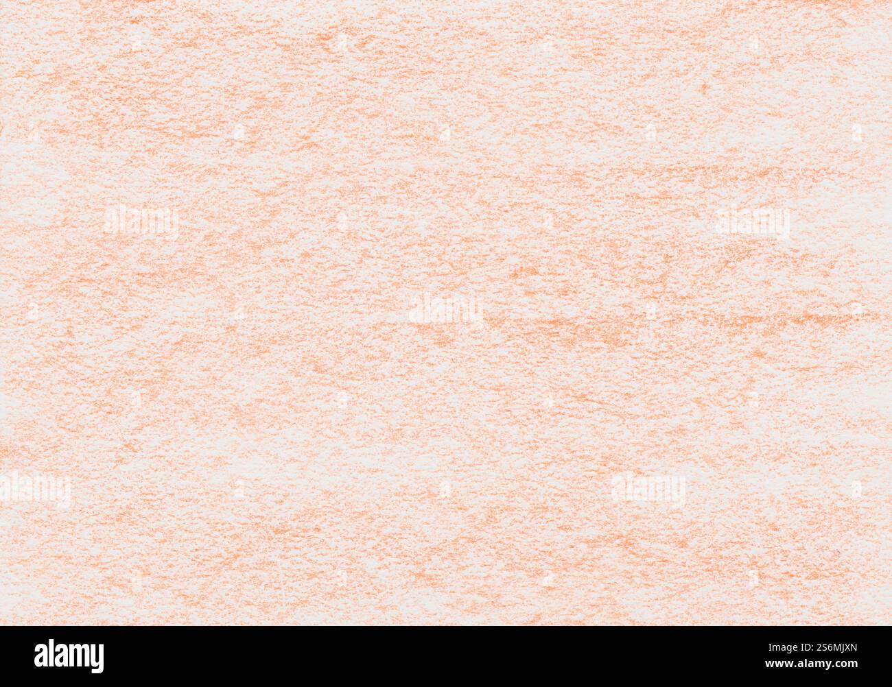 Grana di cera di colore arancione su un foglio di carta bianco Foto Stock