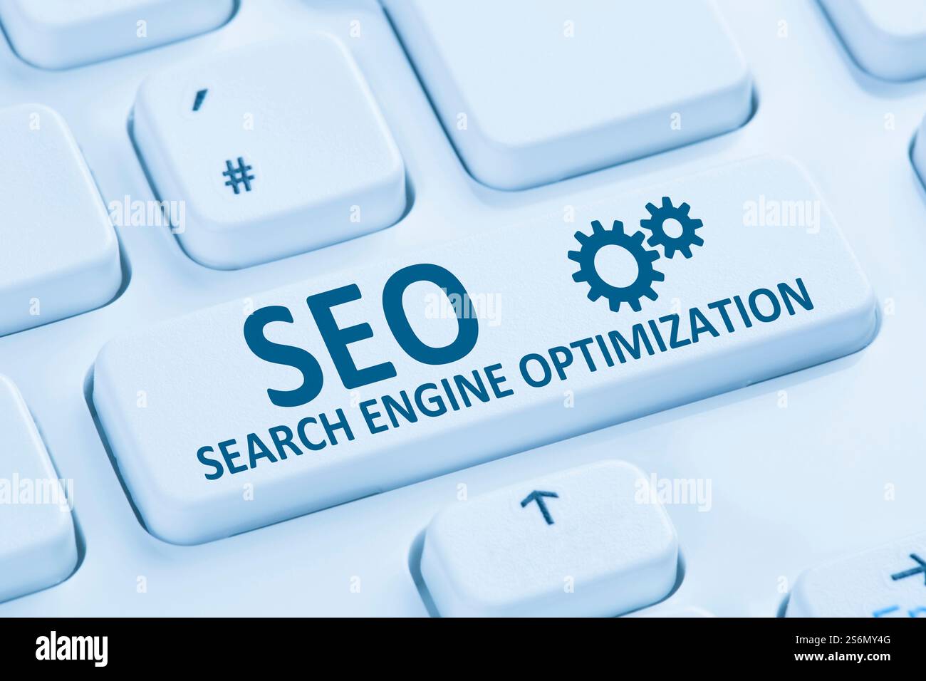 SEO Ottimizzazione del motore di ricerca Ottimizzazione del motore di ricerca icona Internet tastiera blu del computer Foto Stock