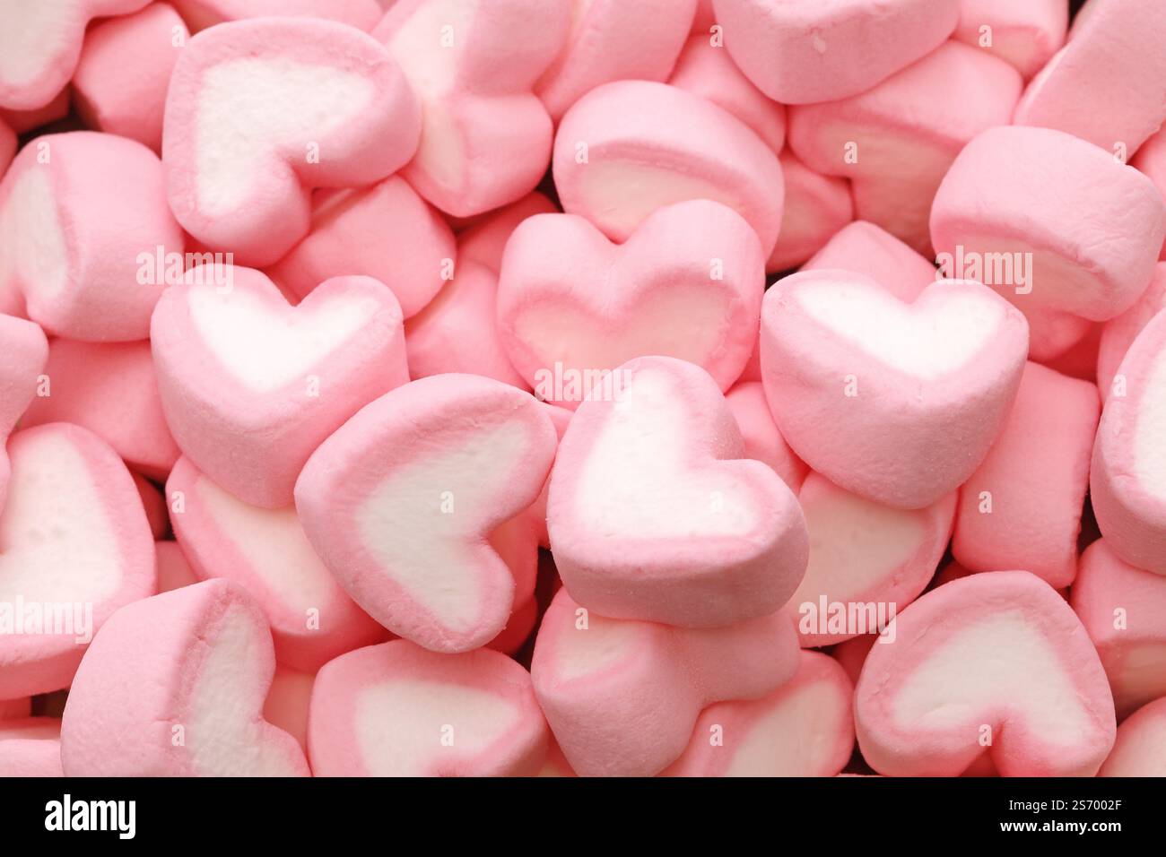 Marshmallow a forma di cuore. Buon san valentino materiale di sfondo. Foto Stock