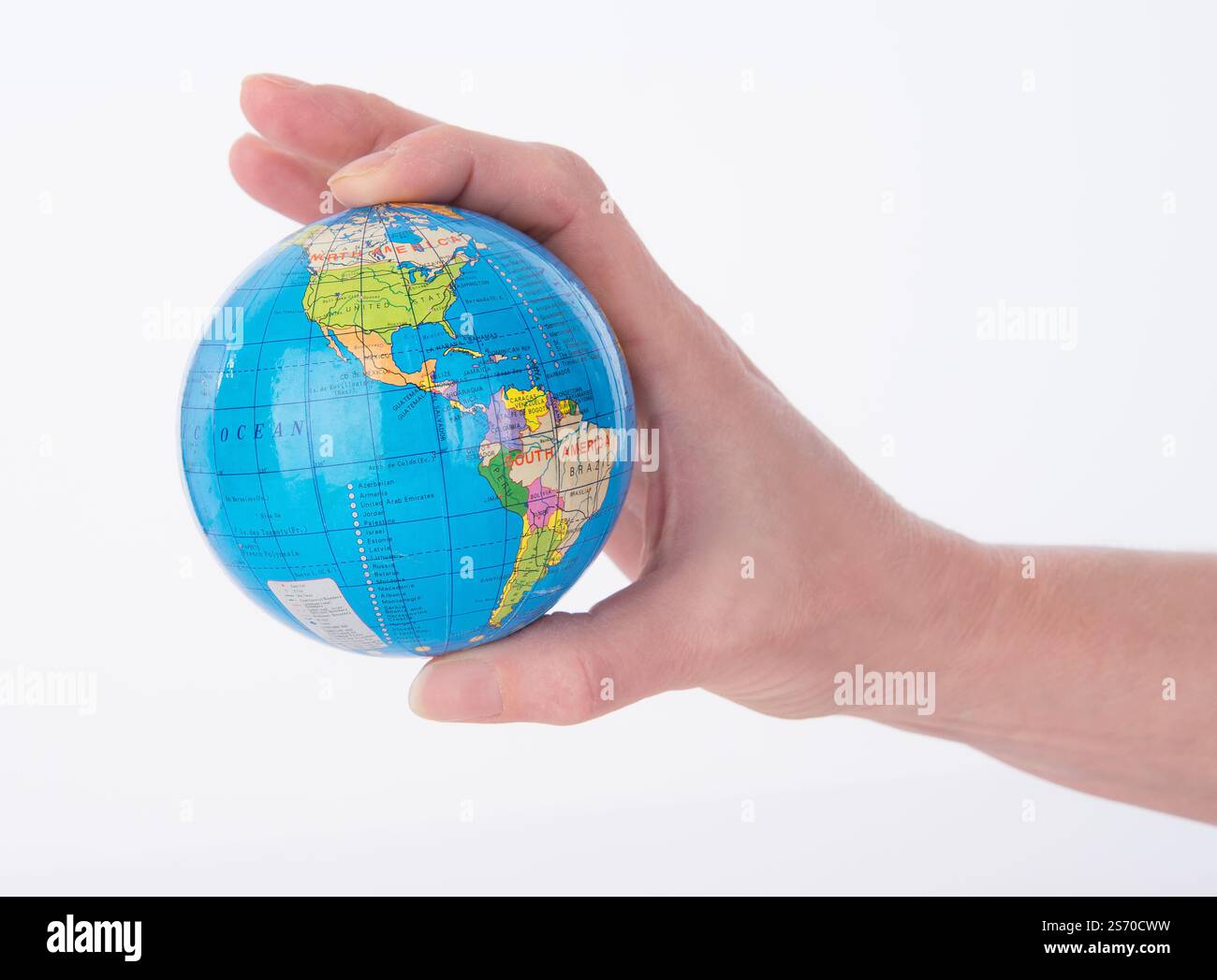 Il Globo mondo a vostra portata di mano childs Foto Stock
