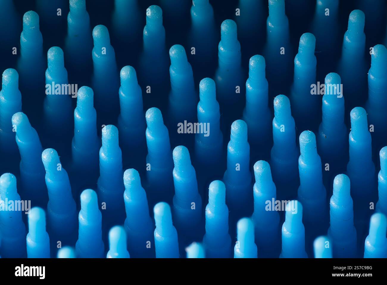 Primo piano astratto di pennini blu gommosi Foto Stock