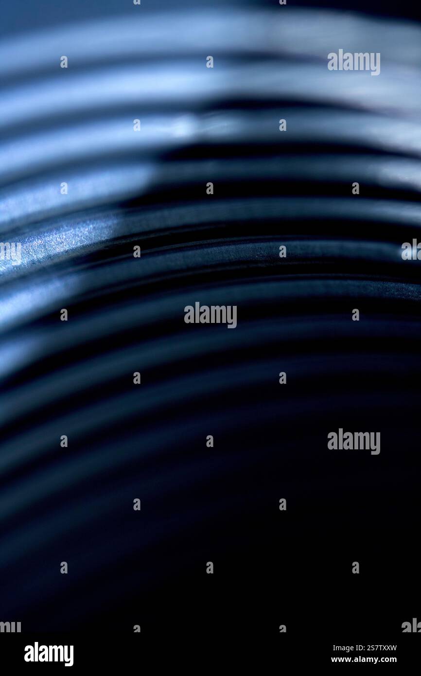 Linee geometriche in metallo astratte Swirl Industrial and Electronic Technology background Foto Stock