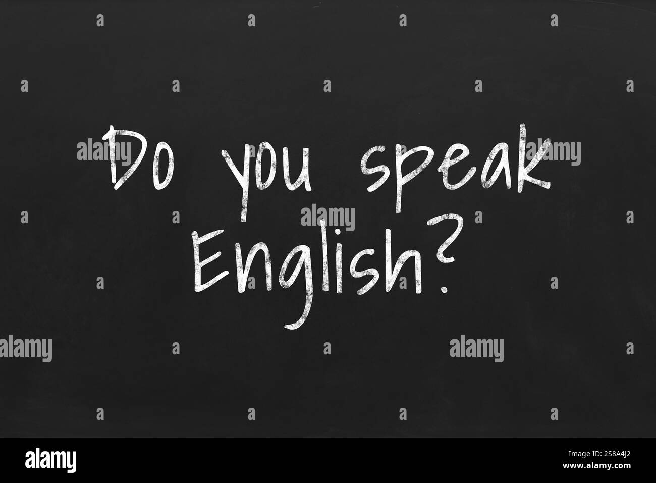 Parla inglese? testo su lavagna nera. Corso di lingua Foto Stock