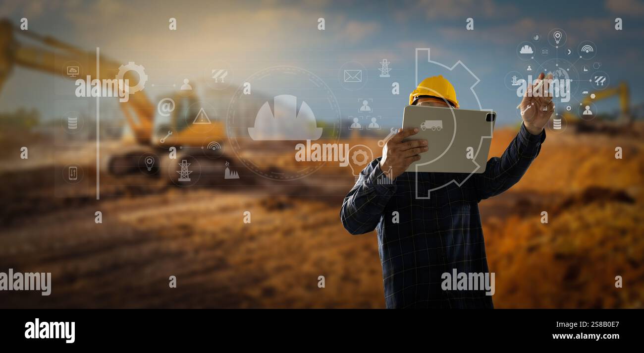 Progetto di costruzione intelligente Un operaio edile utilizza un tablet per visualizzare un modello 3D di un cantiere edile. affari Foto Stock