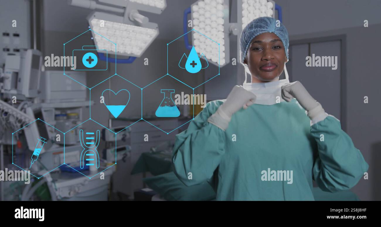 Immagine di icone mediche di rete sopra chirurgo afroamericano che sorride in teatro Foto Stock