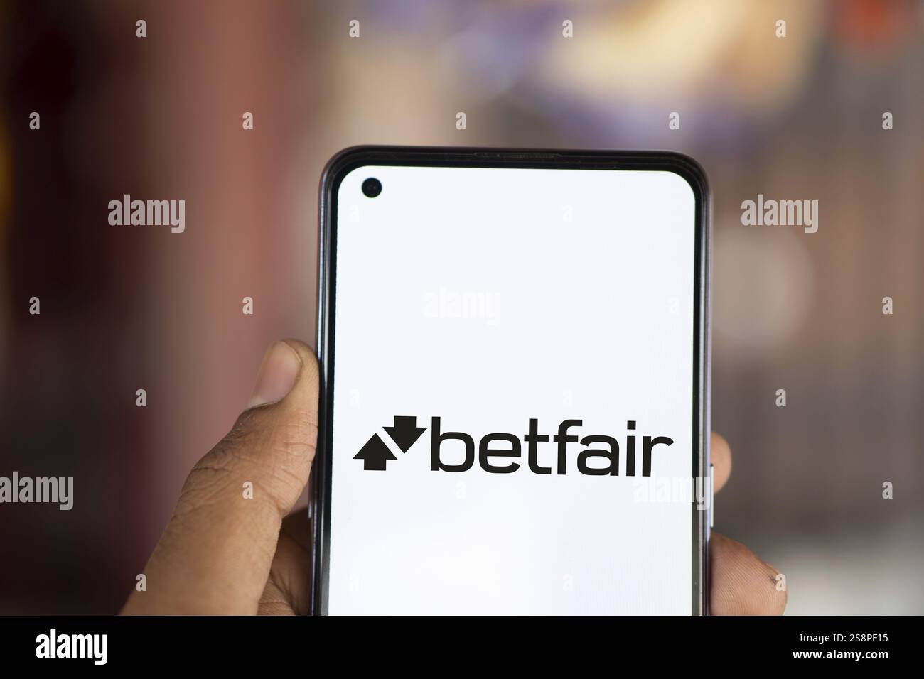il logo betfair viene visualizzato sullo smartphone. Betfair è una società britannica di gioco d'azzardo Foto Stock