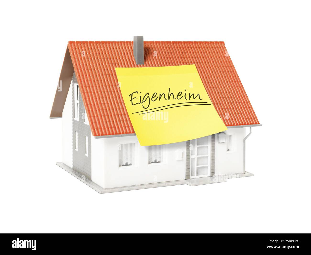 Un'immagine di una bella casa modello con un testo proprio casa in lingua tedesca Foto Stock