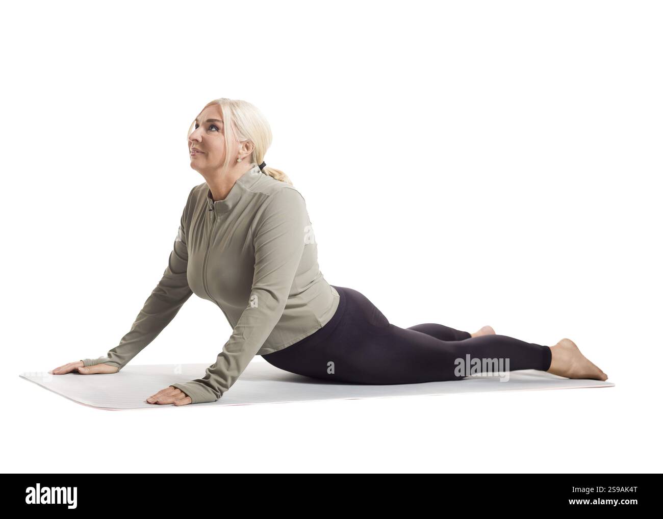 Donne che praticano yoga: Flessibilità ed equilibrio per uno stile di vita attivo Foto Stock