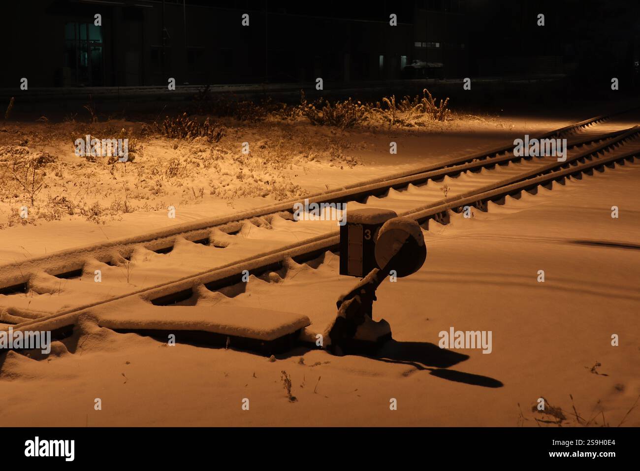 Interruttore della leva in una notte nevosa Foto Stock