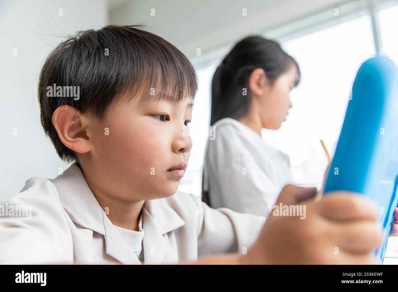 Apprendimento dei bambini con tablet Foto Stock