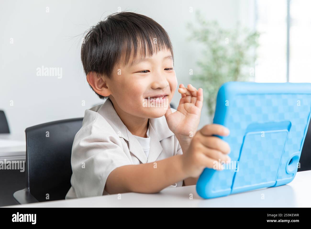 Apprendimento dei bambini con tablet Foto Stock