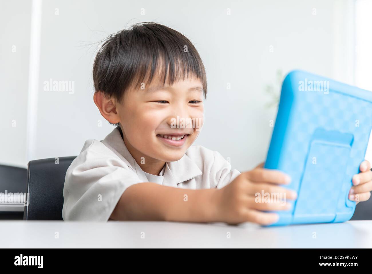 Apprendimento dei bambini con tablet Foto Stock