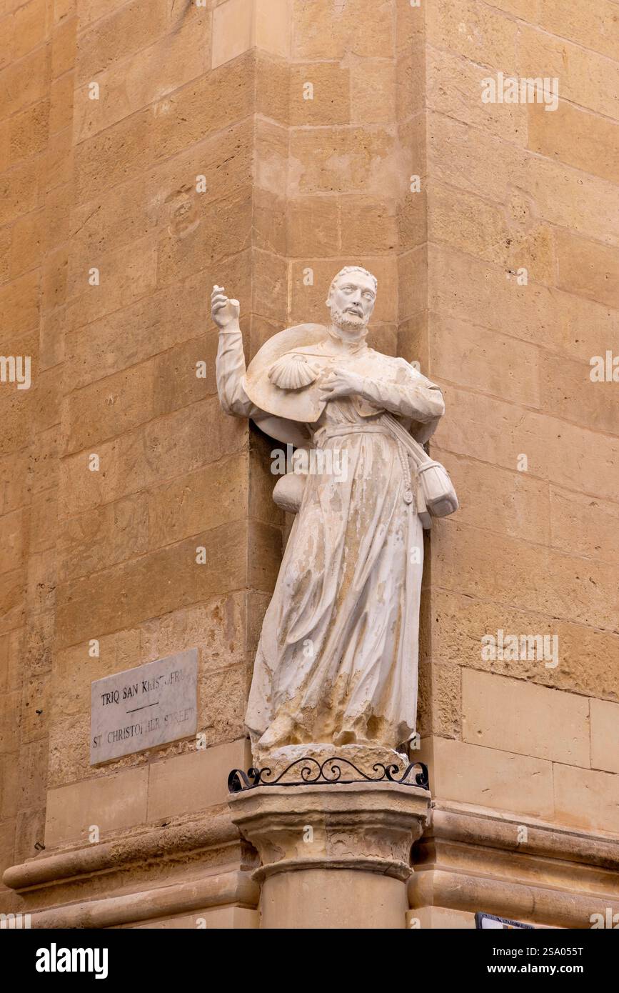 Statua su un vecchio edificio a la Valletta, la Valletta, Malta, Europa meridionale Foto Stock