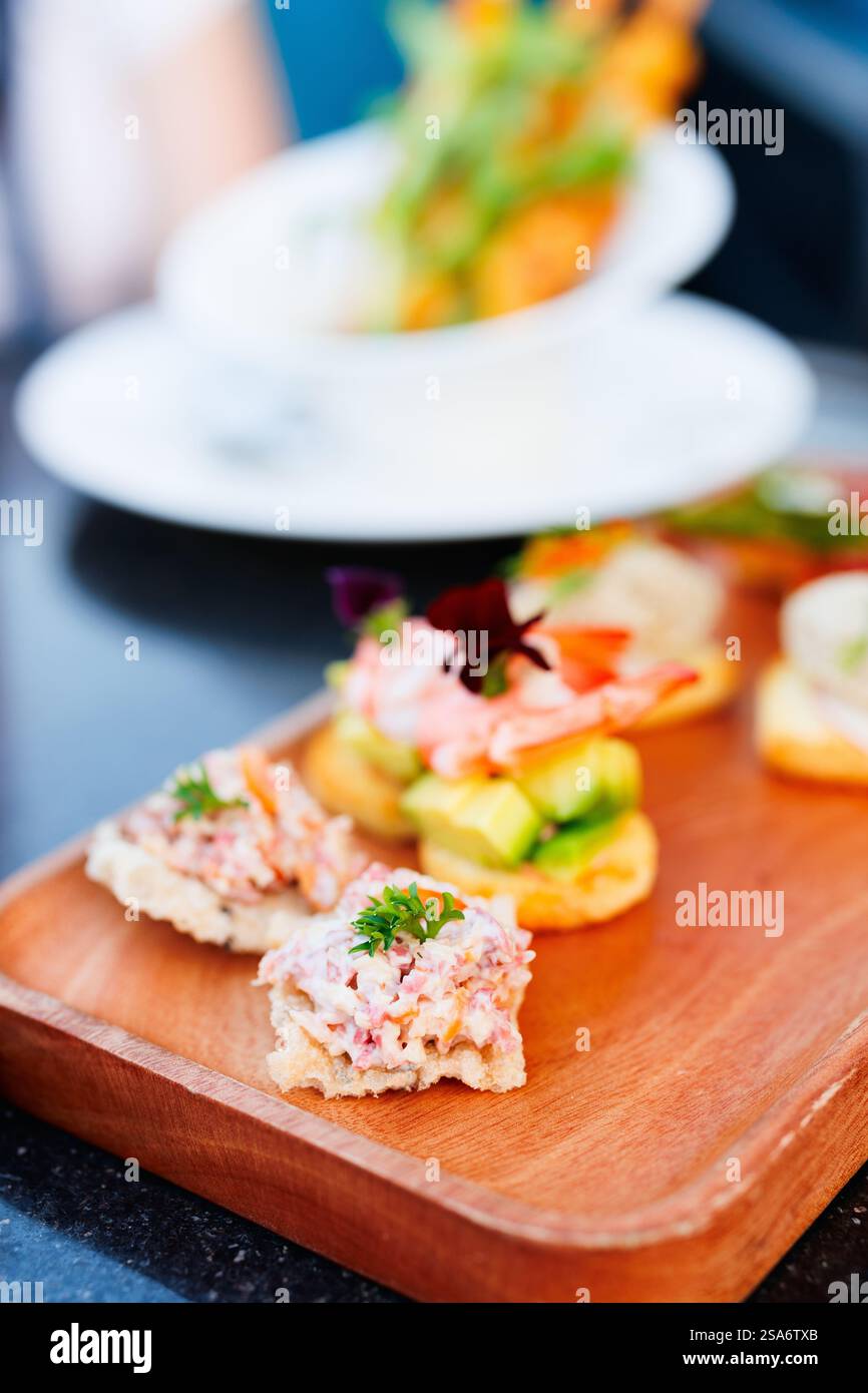 Piccolo boccone e snack a bordo Foto Stock