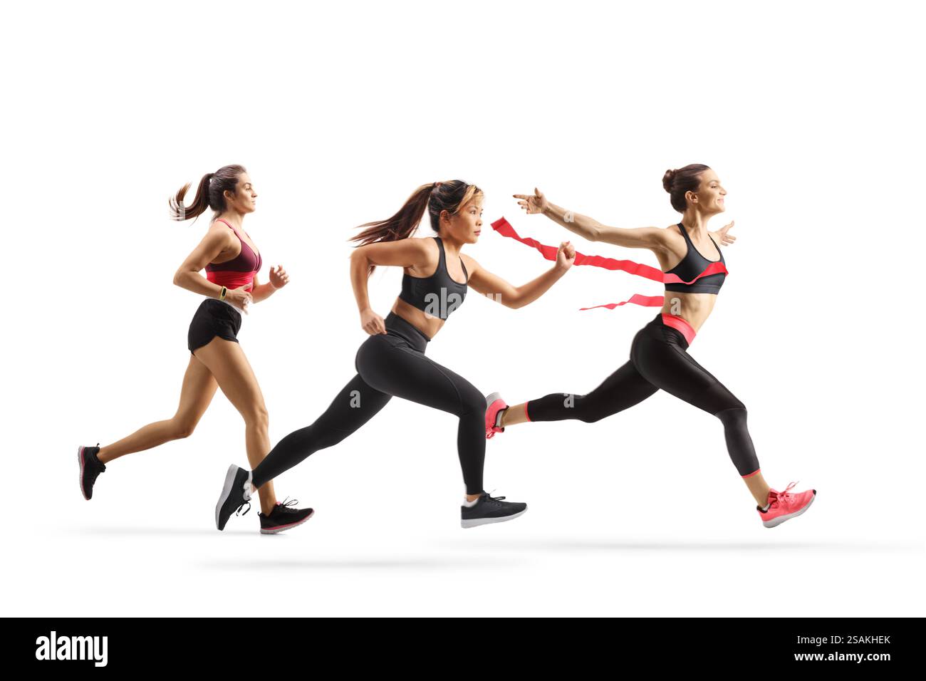 Foto a tutta lunghezza di un gruppo di donne che corrono una gara isolata su sfondo bianco Foto Stock