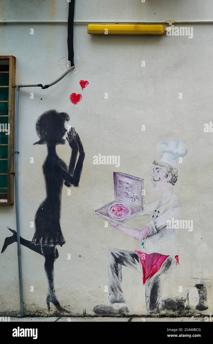 Lo chef offre Pizza all'amata - murale di strada dipinto dall'artista Josy Poschmann vicino al Barista Cafe in Church Street a Georgetown, Penang, Malesia Foto Stock