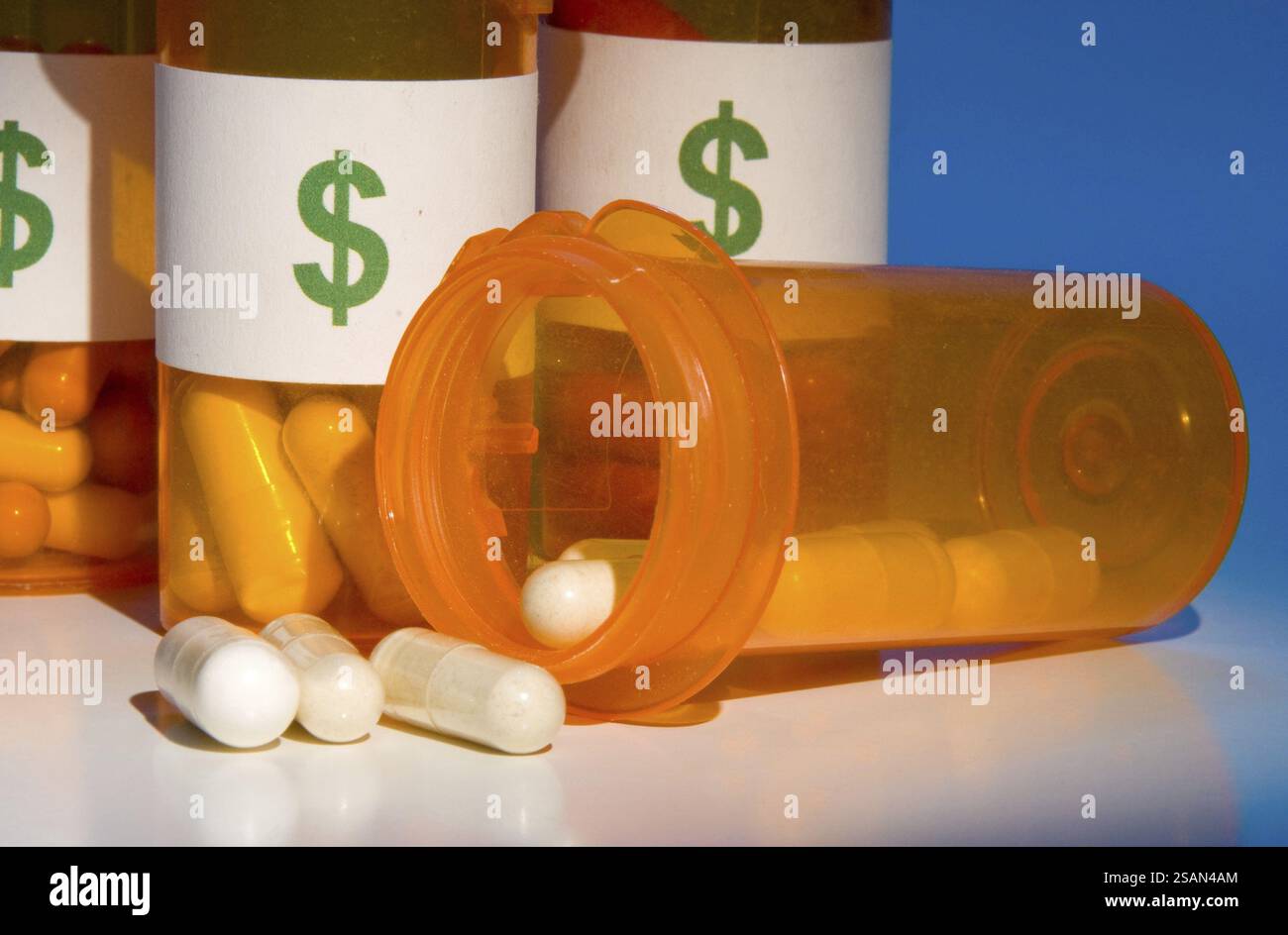 L'alto costo dei farmaci è come versare soldi nello scarico Foto Stock