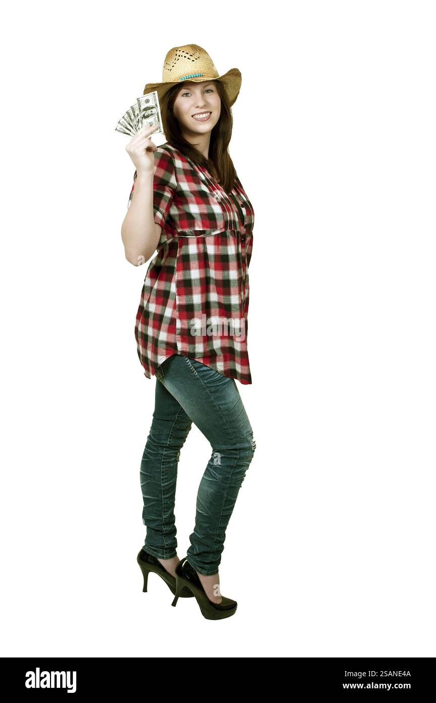 Bella donna tenendo una mano piena di 100 fatture del dollaro Foto Stock