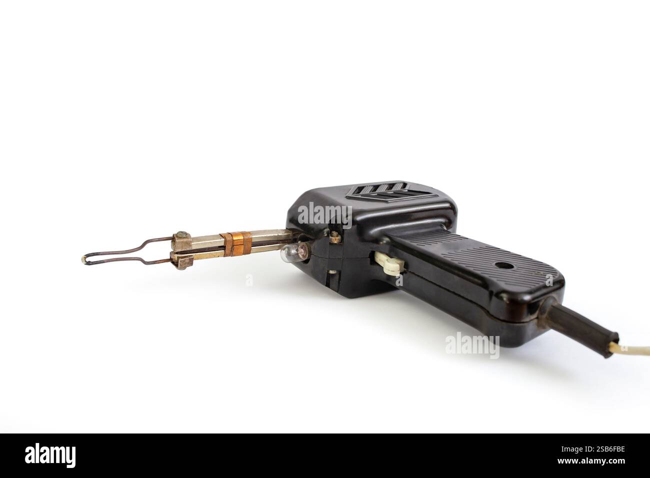 Pistola per saldatura elettronica vintage, vista laterale, isolata su bianco Foto Stock