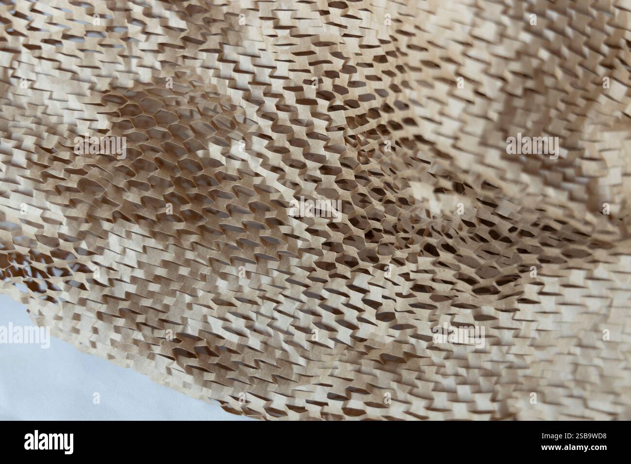 Stucco per imballaggio in carta marrone per scatola di spedizione, primo piano Foto Stock