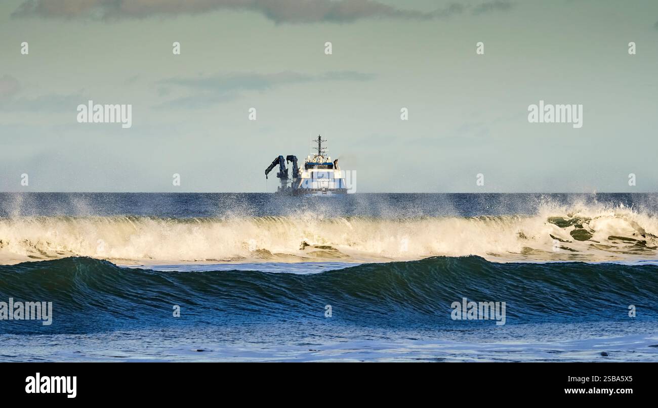 "Isola del Giura" che lavora presso Marske.Seafast. Foto Stock