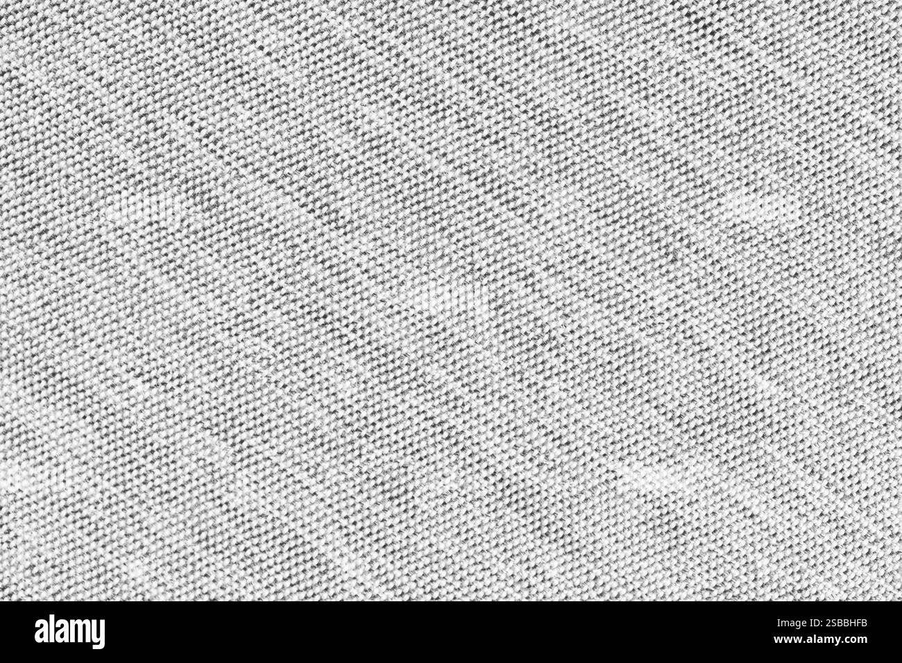 Primo piano, macro di sfondo a trama bianca. Struttura in tessuto diagonale satinato, tela. Tessuto per arredamento, tappezzeria, indumenti. Carta da parati, Foto Stock