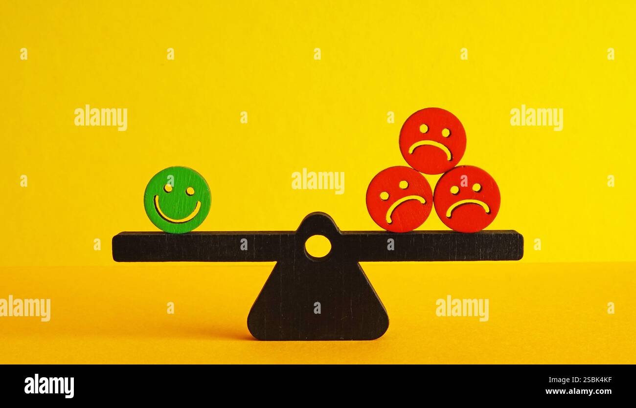 Un'emozione positiva equivale a diverse emozioni negative come concetto di mentalità ed equilibrio emotivo. Foto Stock