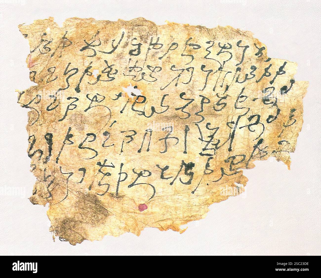 7465. La scrittura Kharosthi, nota anche come scrittura Gandhari, era un'antica scrittura indiana usata da vari popoli delle parti nord-occidentali dell'India Foto Stock