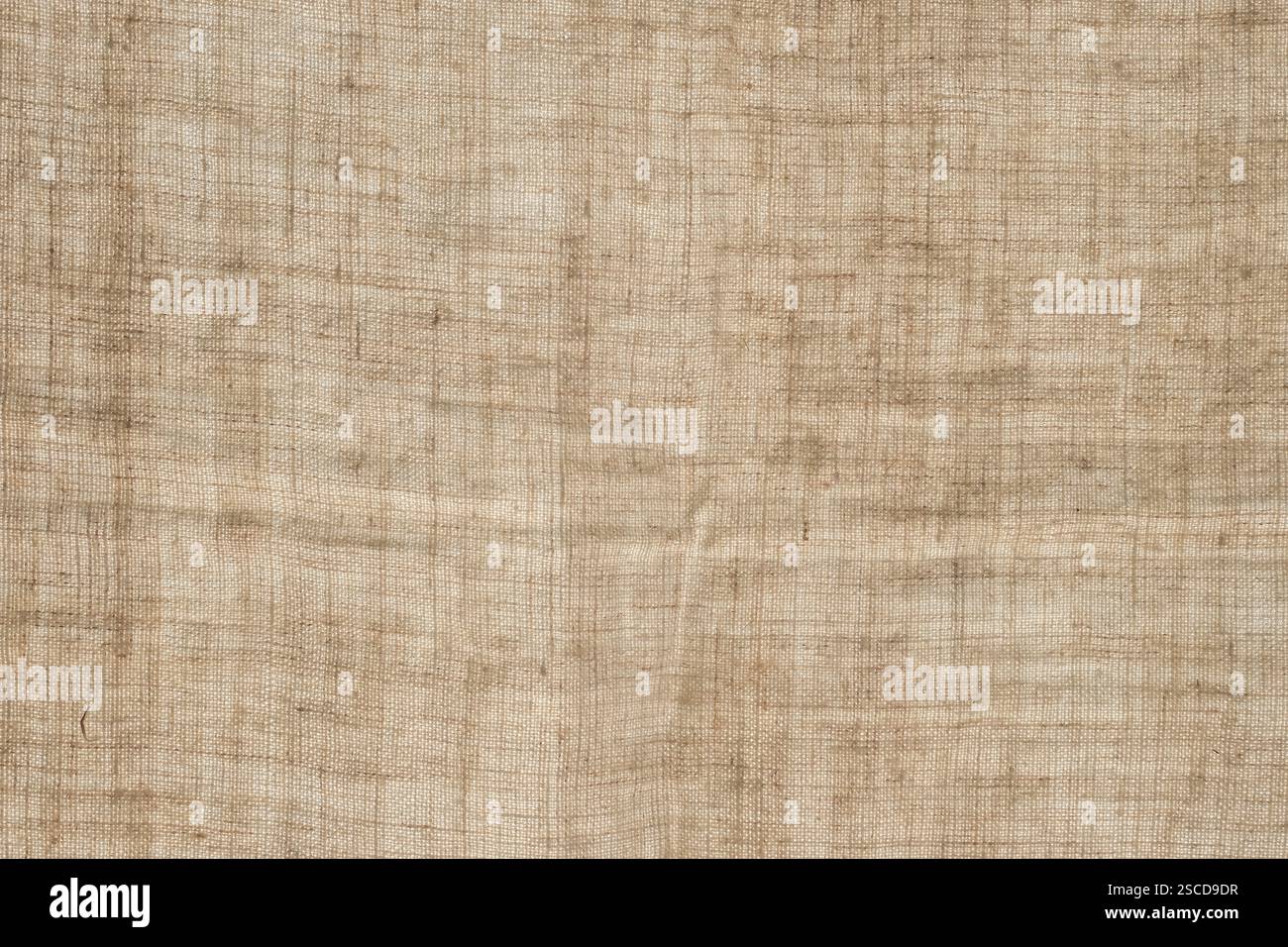 Tela di canapa contro il sole. Tessuto ruvido, realizzato con fili grossolani e resistenti. Copia spazio. Foto Stock