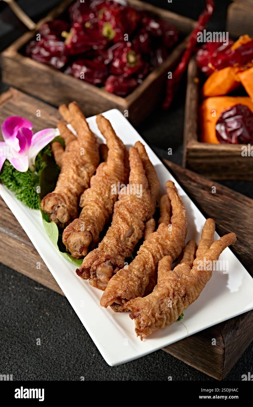 Ingredienti caldi: Piedi di pollo con pelle di tigre Foto Stock