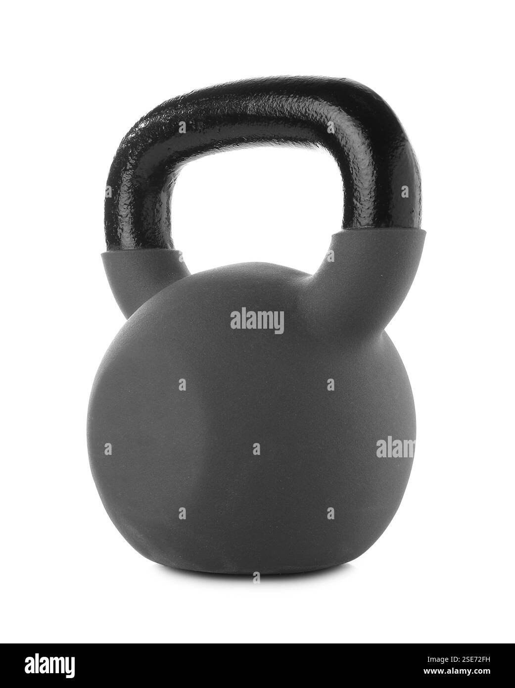 Un grosso kettlebell isolato su bianco. Attrezzatura sportiva Foto Stock