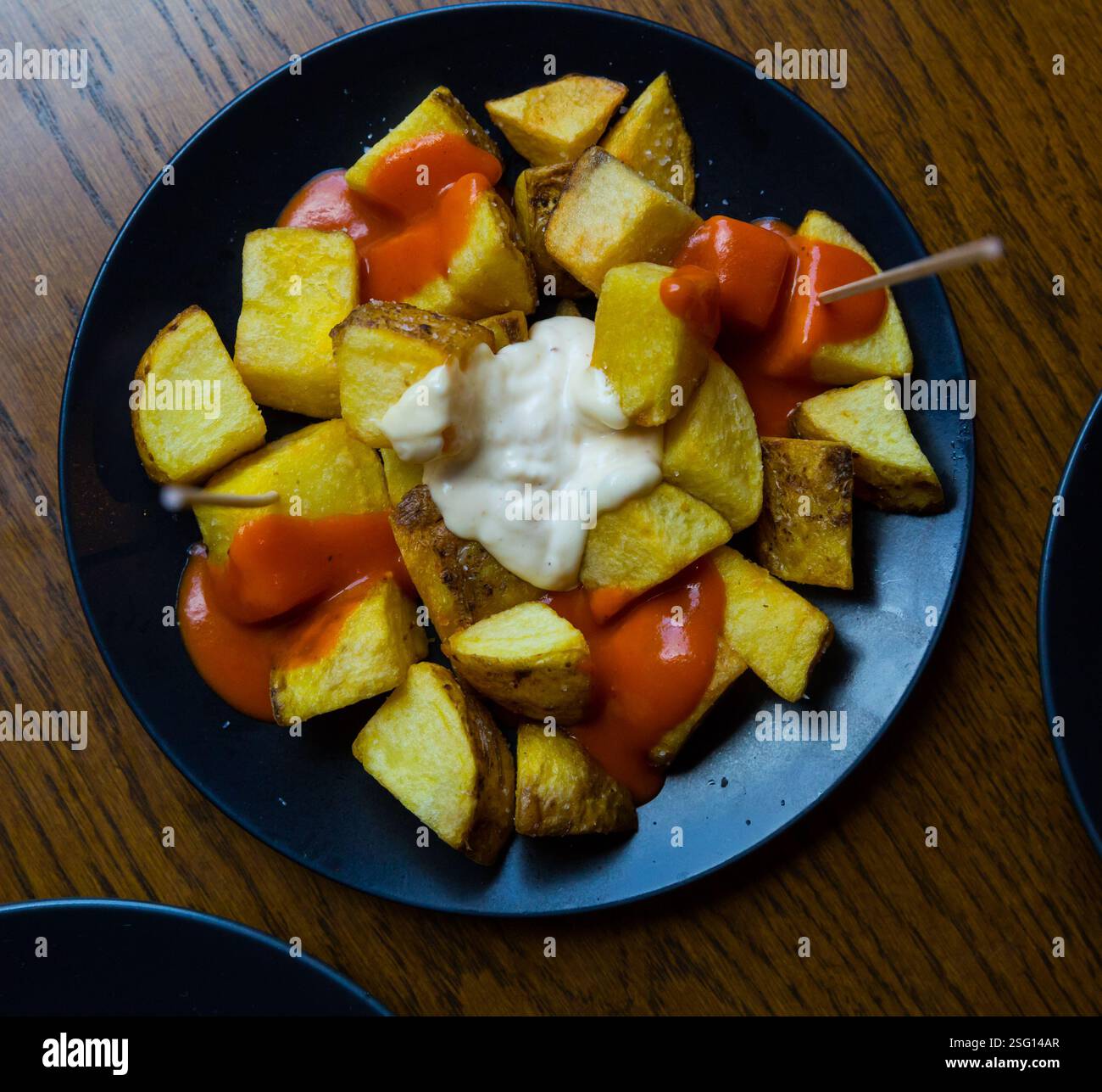 Tapas spagnole Patatas bravas Foto Stock