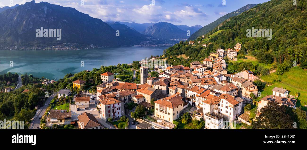 Lago Lugano, Italia . Idilliaco paesaggio lacustre e incantevoli paesini di Claino e Osteno, vista panoramica aerea. Regione Lombardia, provincia di Como Foto Stock