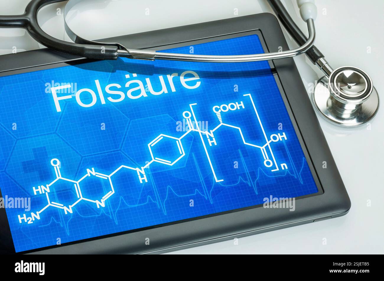Compressa con la formula chimica strutturale dell'acido folico Foto Stock