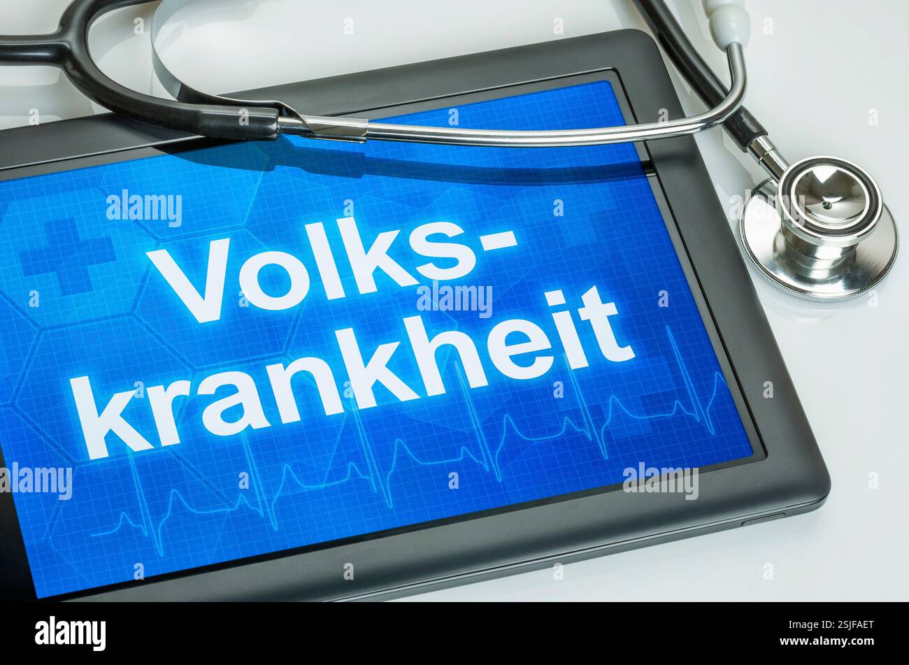 Tablet con il testo Volkskrankheit sul display Foto Stock