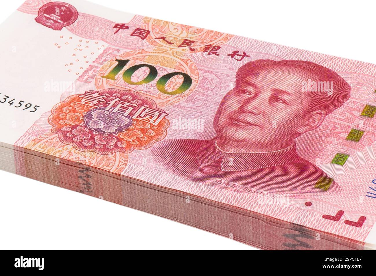 I soldi di Yuan sono isolati su sfondo bianco. Una pila di banconote da cento yuan. Nota bancaria cinese 100 Yuan su sfondo bianco isolato. Valuta cinese Foto Stock