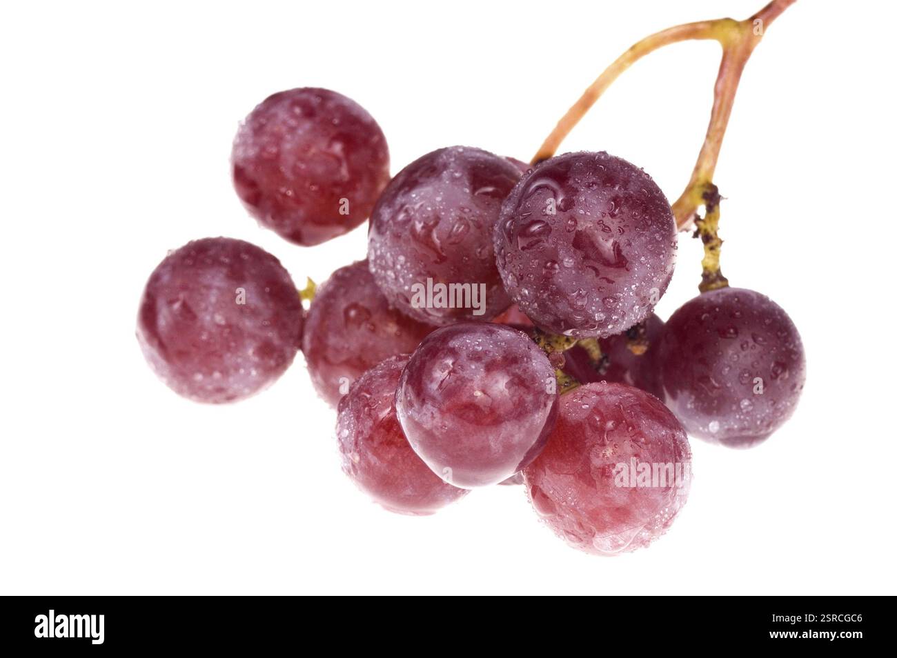 Un mucchio di uva deliziosa isolata sul bianco Foto Stock