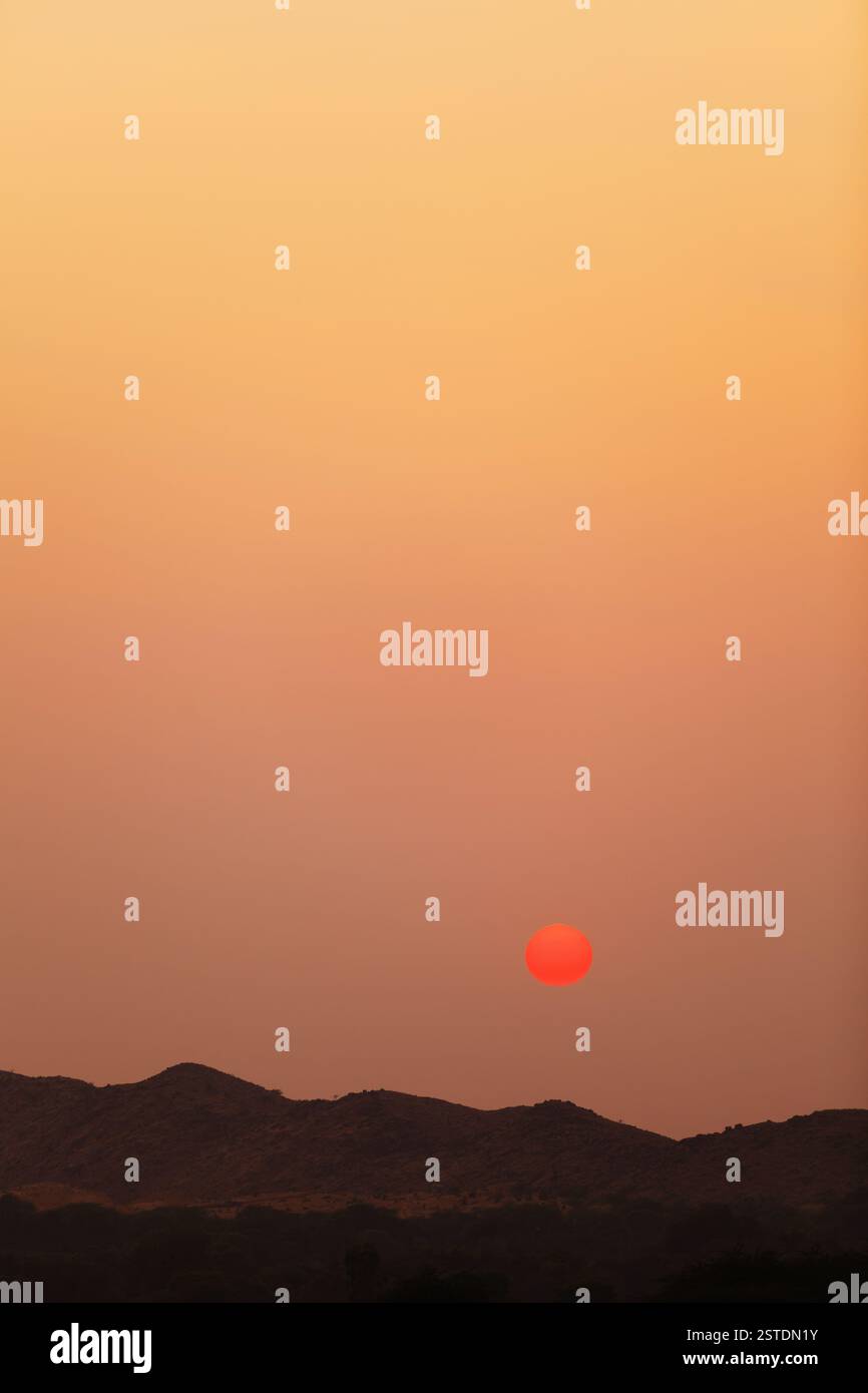 Tramonto sulle colline Foto Stock