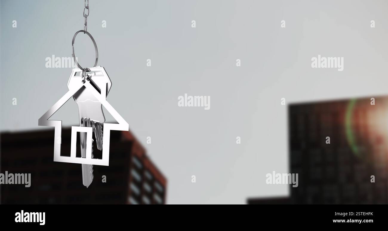Immagine del portachiavi della casa su sfondo sfocato del paesaggio urbano Foto Stock