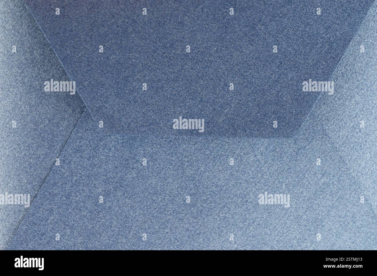 Le superfici a trama esagonale creano un design astratto accattivante in più tonalità di blu. Foto Stock