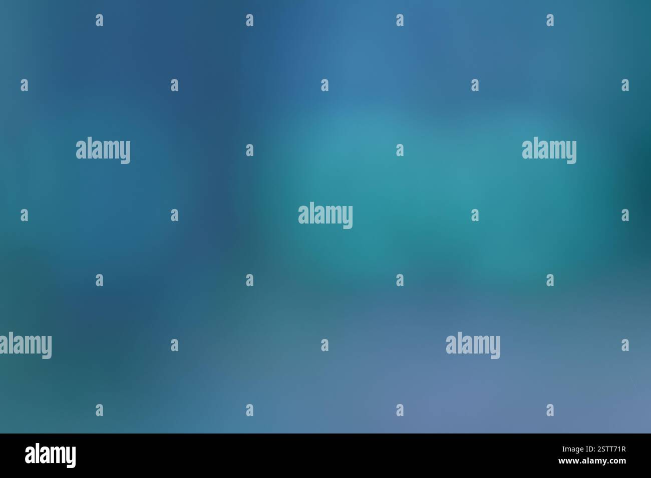Immagine sfocata di una sfumatura verde acqua e blu i colori si fondono delicatamente creando un effetto rilassante Foto Stock
