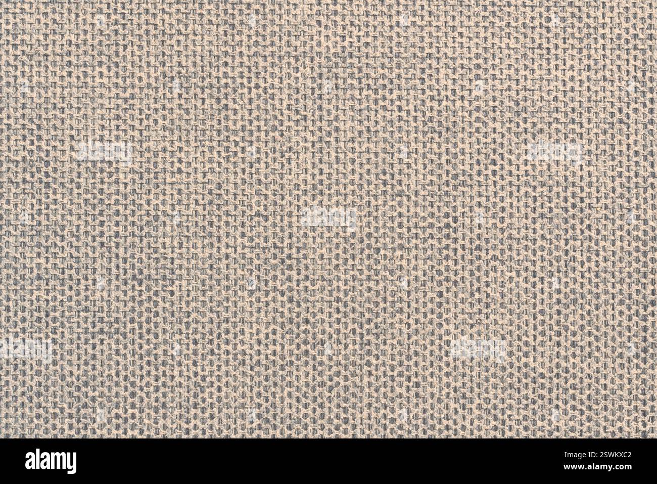 Tessuto in cotone beige per cuscini da divano texture di fondo. Fotografia in primo piano ad alta risoluzione adatta per sfondi, grafica e progetti di moda Foto Stock