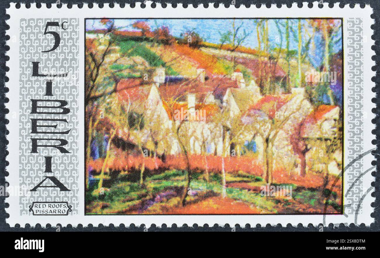 Francobollo cancellato stampato da Liberia, che mostra la pittura dei tetti rossi di Camille Pisarro, circa 1969. Foto Stock