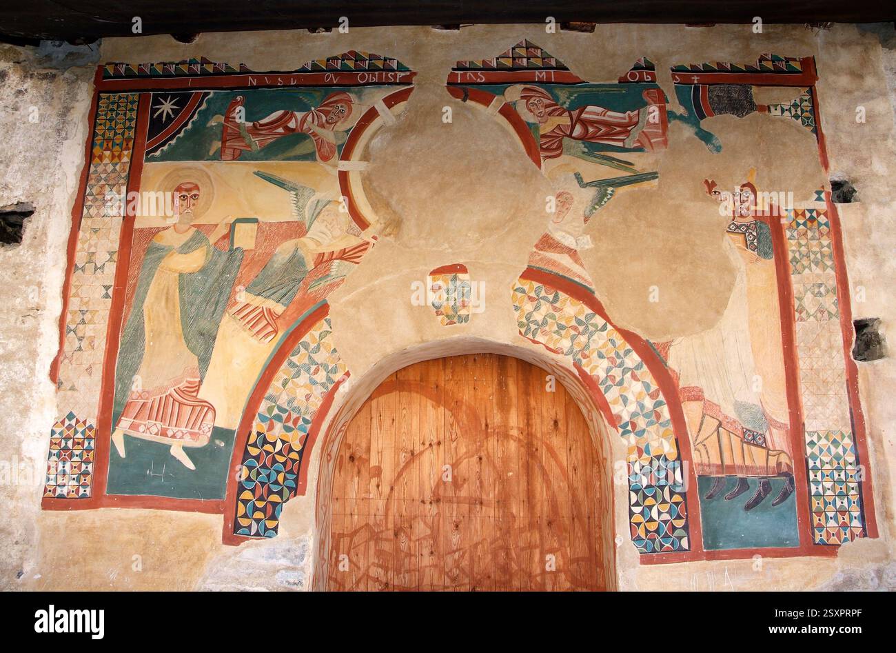 Boí, chiesa di Sant Joan (romanica, XI secolo e più tardi). Dipinti portali. Comune di Vall de Boí, alta Ribaganza, Lleida, Catalogna, Spagna. Foto Stock