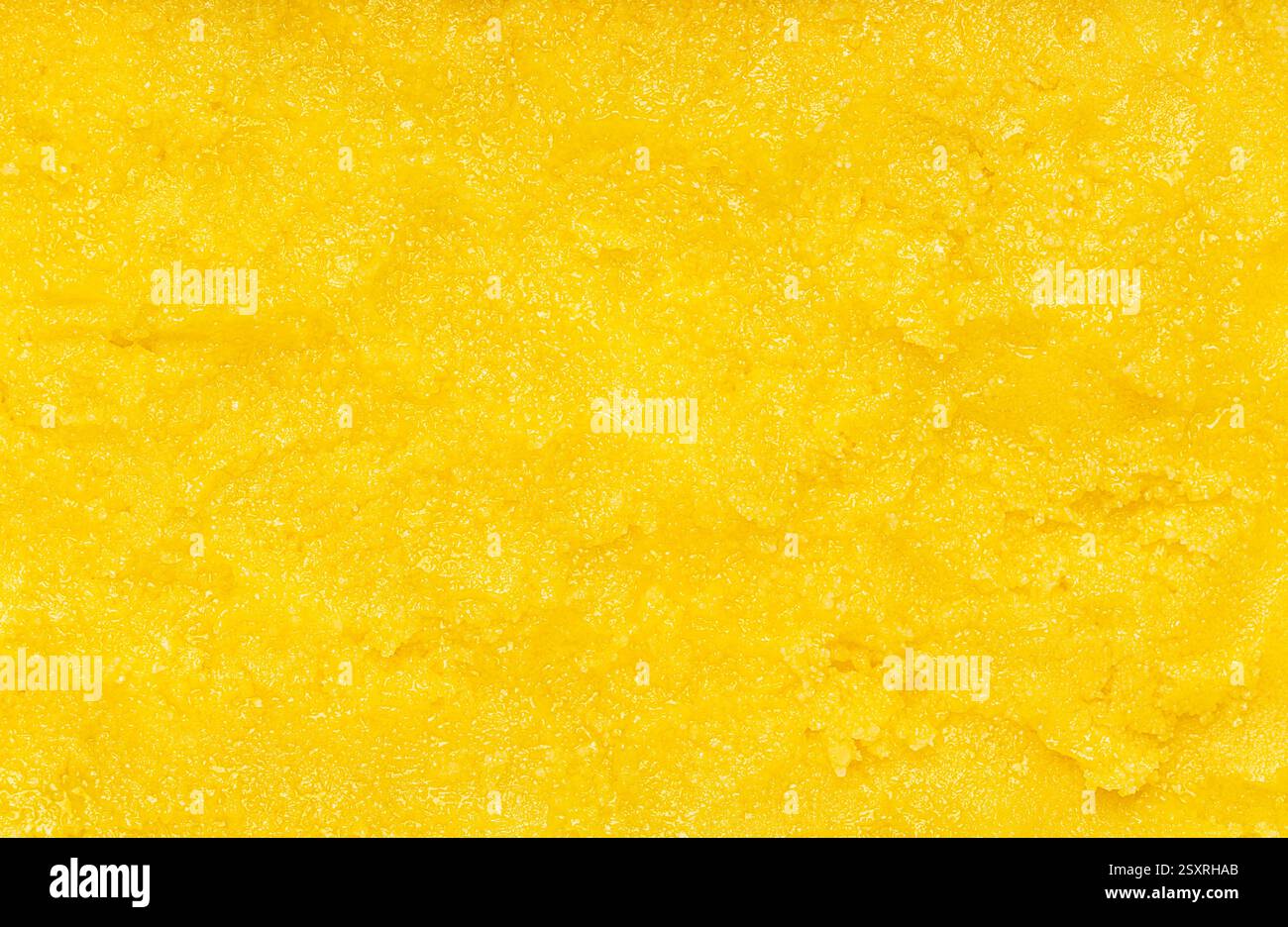 Macrofotografia di puro ghee di burro, burro chiarificato, burro fuso, senza lattosio, ayurveda Foto Stock