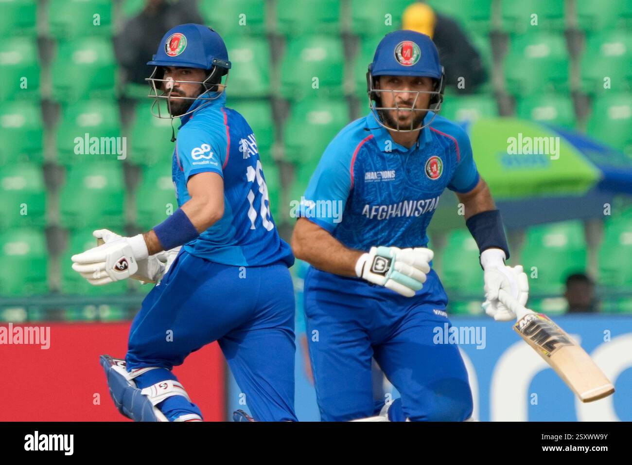 Rahmat Ran Afghanistan's Ibrahim Zadran, left, and Rahmat Shah run between the ...