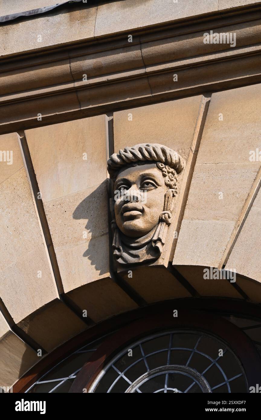 Grottesche sulla parete esterna dello Sheldonian Theatre, Oxford Foto Stock