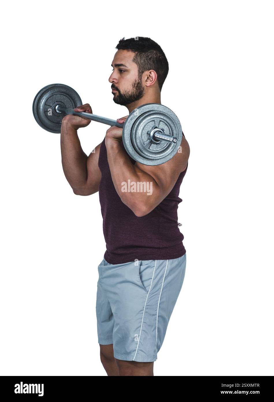 Uomo muscoloso che solleva il barbell, concentrandosi sull'allenamento di forza e il fitness Foto Stock
